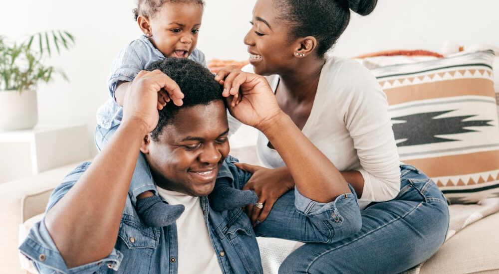 a happy family with an updated funeral cover