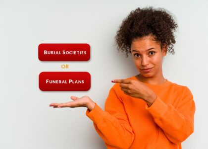 A young african woman pointing to two choices on her right.